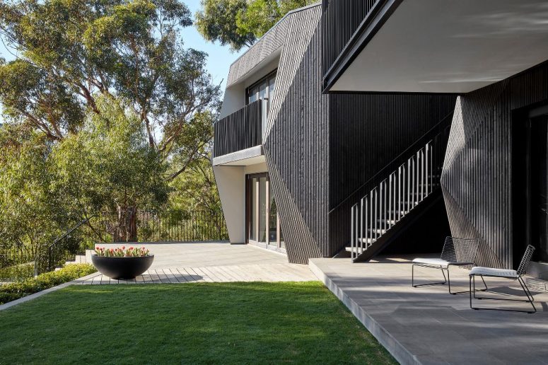House clad in black cypress