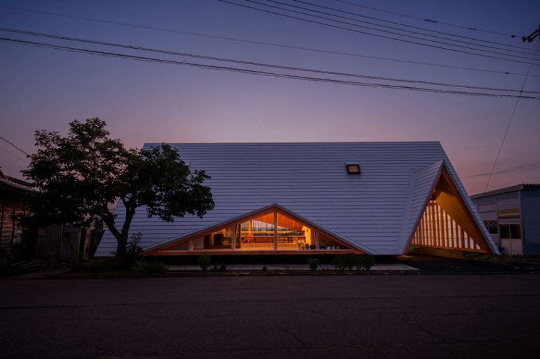 House in the form of a wooden tent