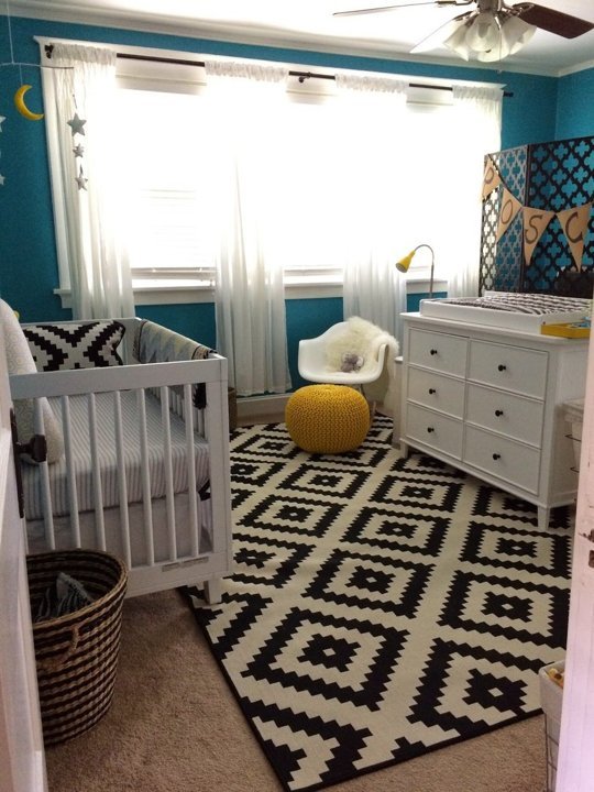 Turquoise nursery design with black and white yellow accents