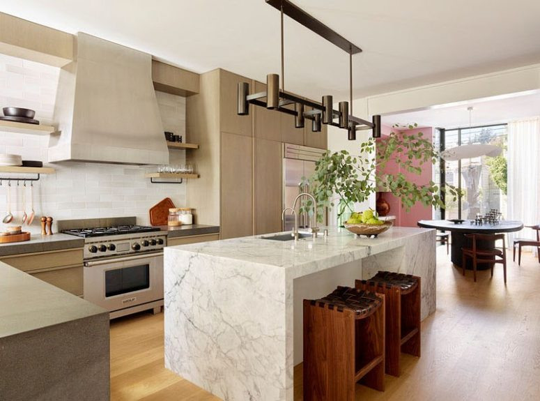 Contemporary home with whimsy touches |  marble kitchen island.