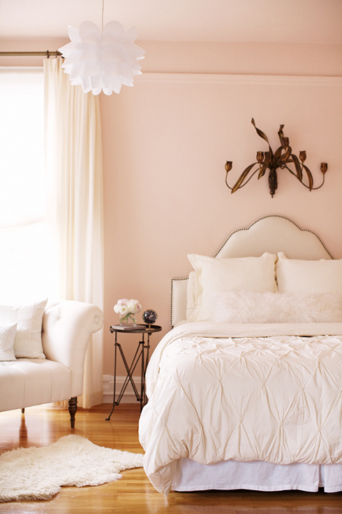 Gorgeous summer bedroom design in peach and white
