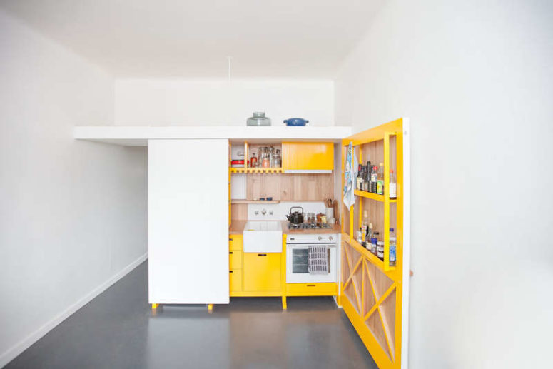 Ultra small yellow kitchen