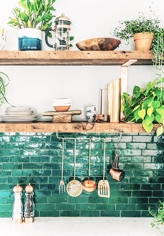 A green painted brick backsplash is a striking and bold idea for a modern kitchen, it adds color and interest to the room