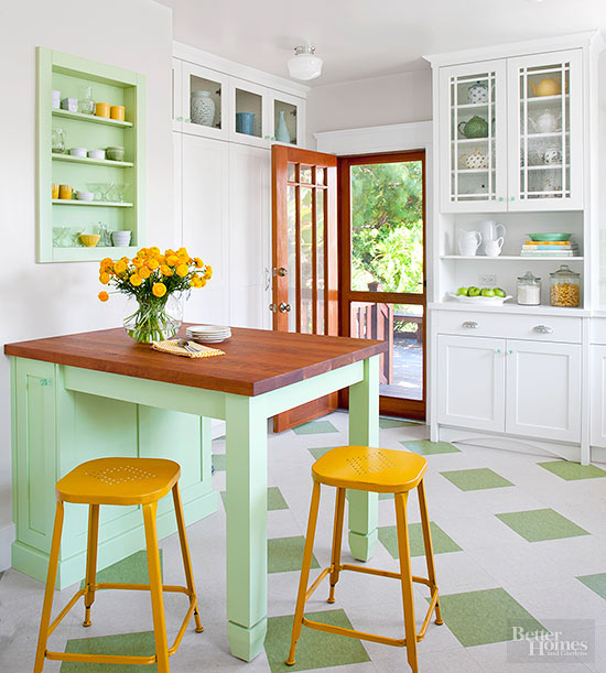 A traditional modern kitchen with a bold color palette - green and yellow for a fresh touch