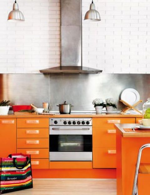 a modern bright orange kitchen design