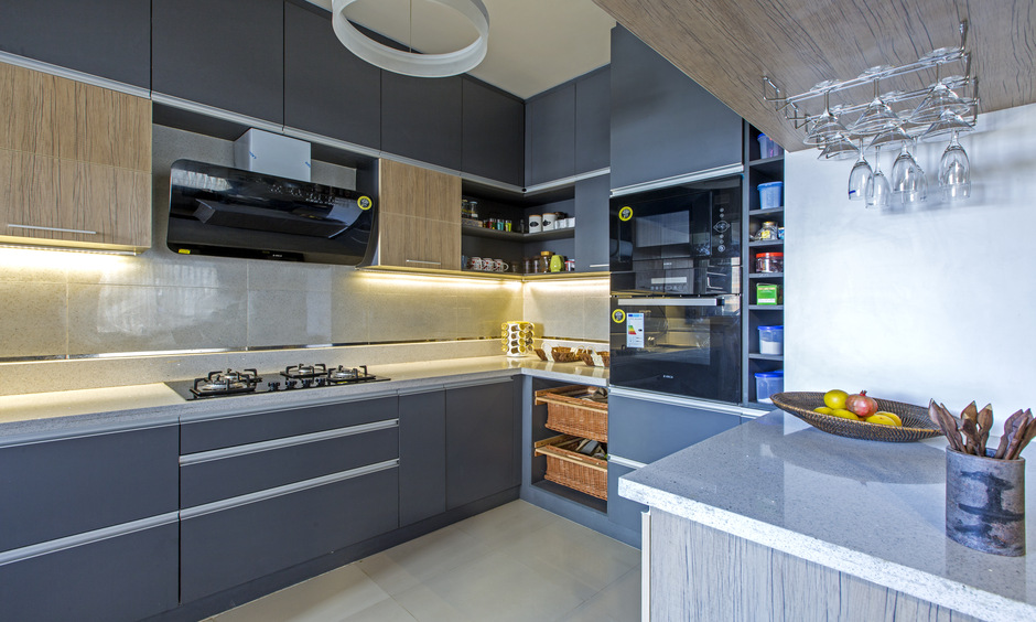 Under-cabinet lights add depth and brightness to your small, budget kitchen ideas