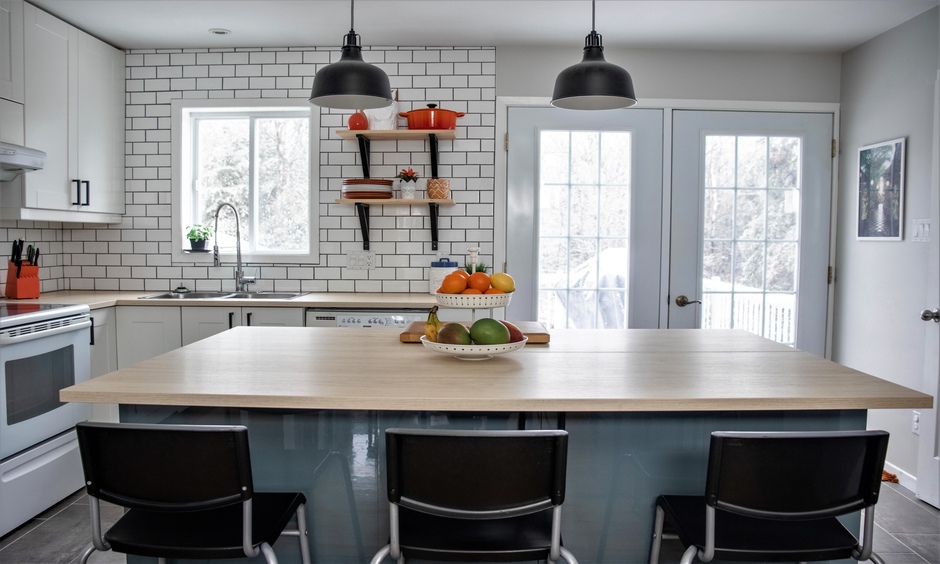 Modular kitchen wood panel design with an elegant finish and plenty of storage space