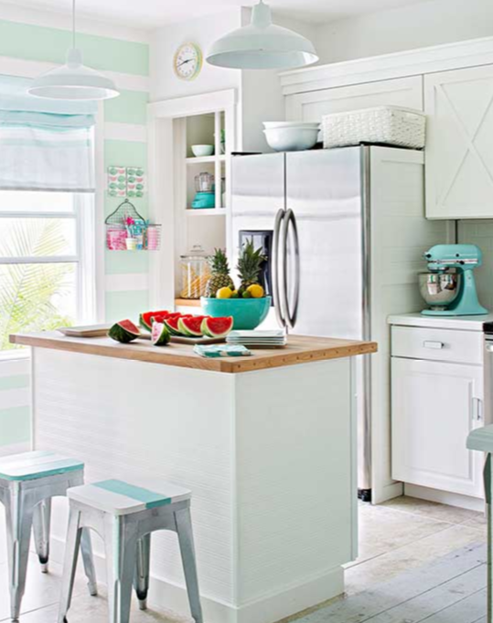 X detailed cabinets are paired with industrial stools, vintage fixtures, and turquoise accents