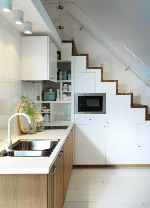 minimalist kitchen organizer under the stairs