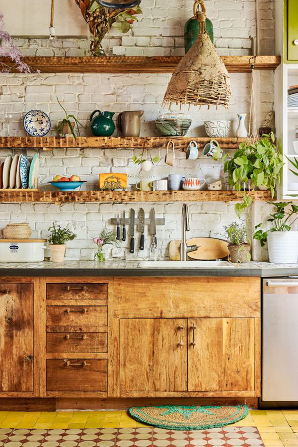 Nature-inspired kitchen decor with exposed brick walls