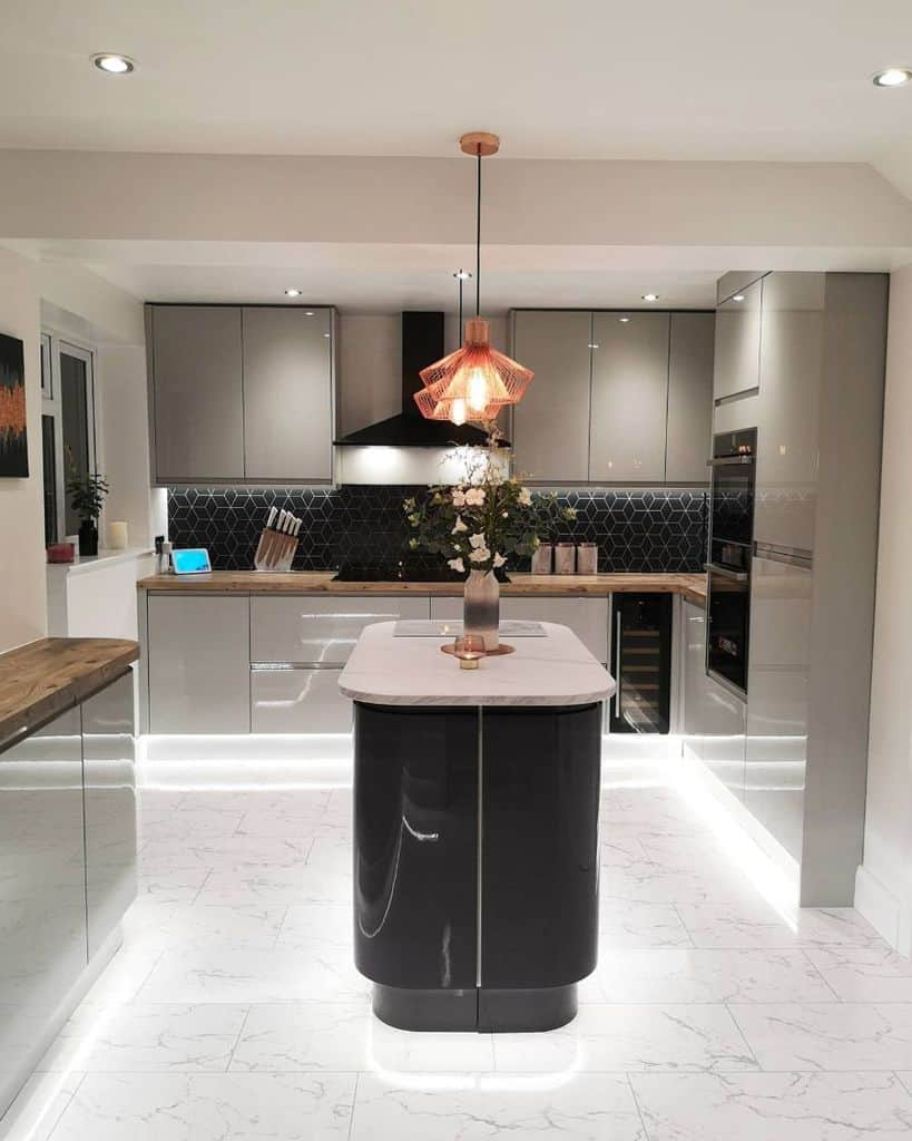 Small modern kitchen with LED lighting under the cabinet 