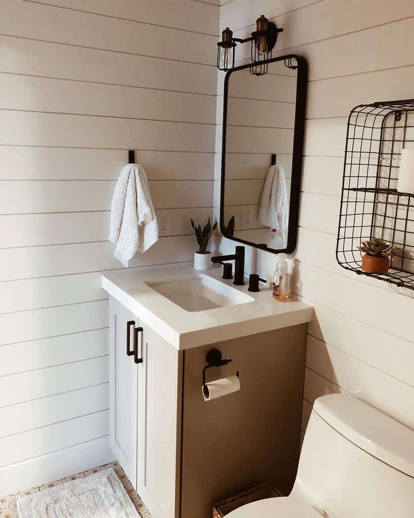 White, rustic powder room with ship's edge 
