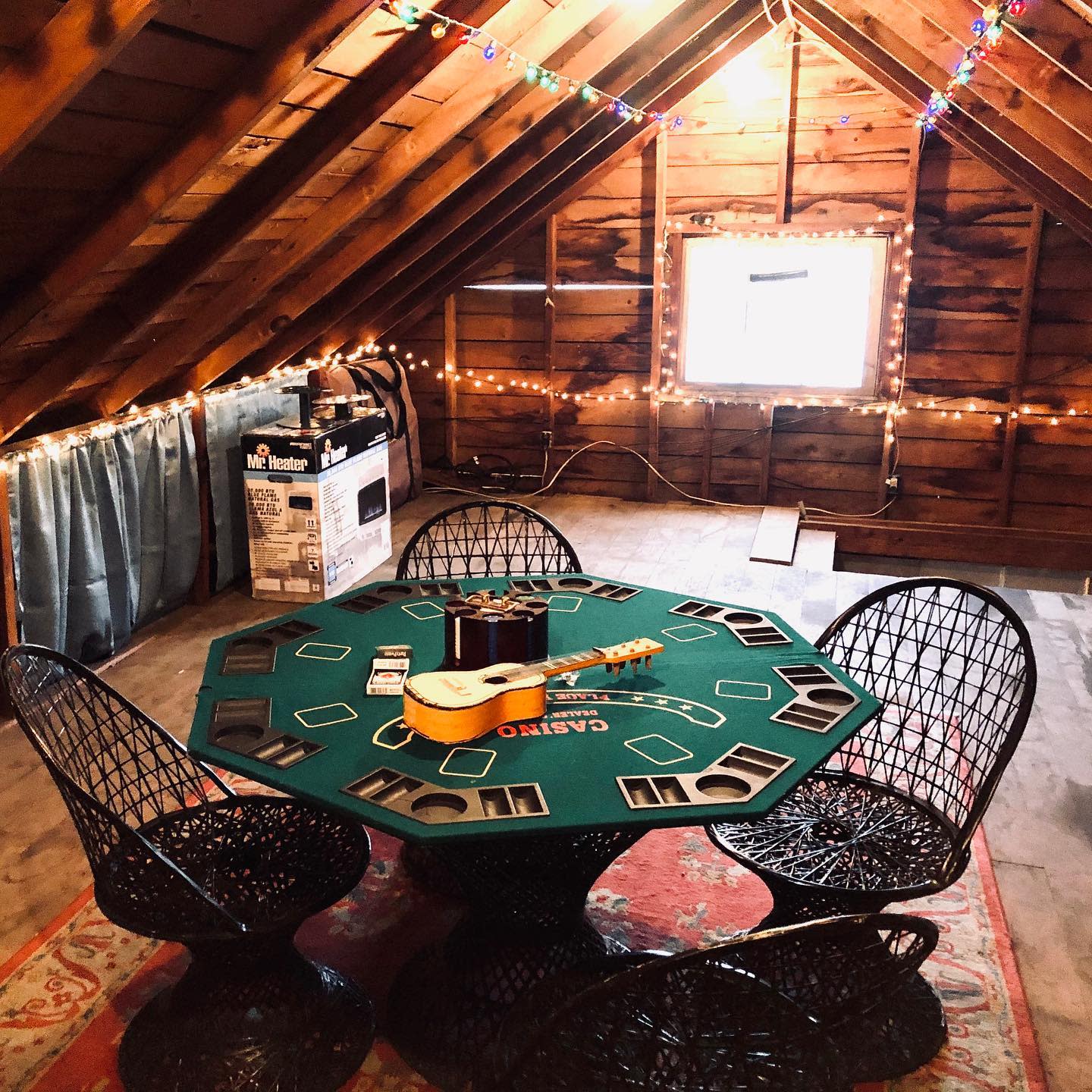 Poker room in the loft with fairy lights 