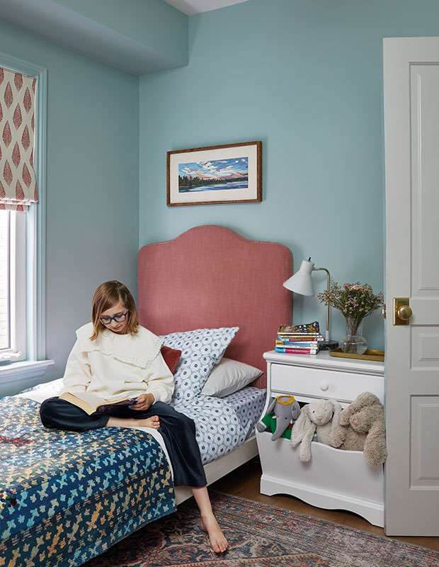 Pink bed in colorful children's room