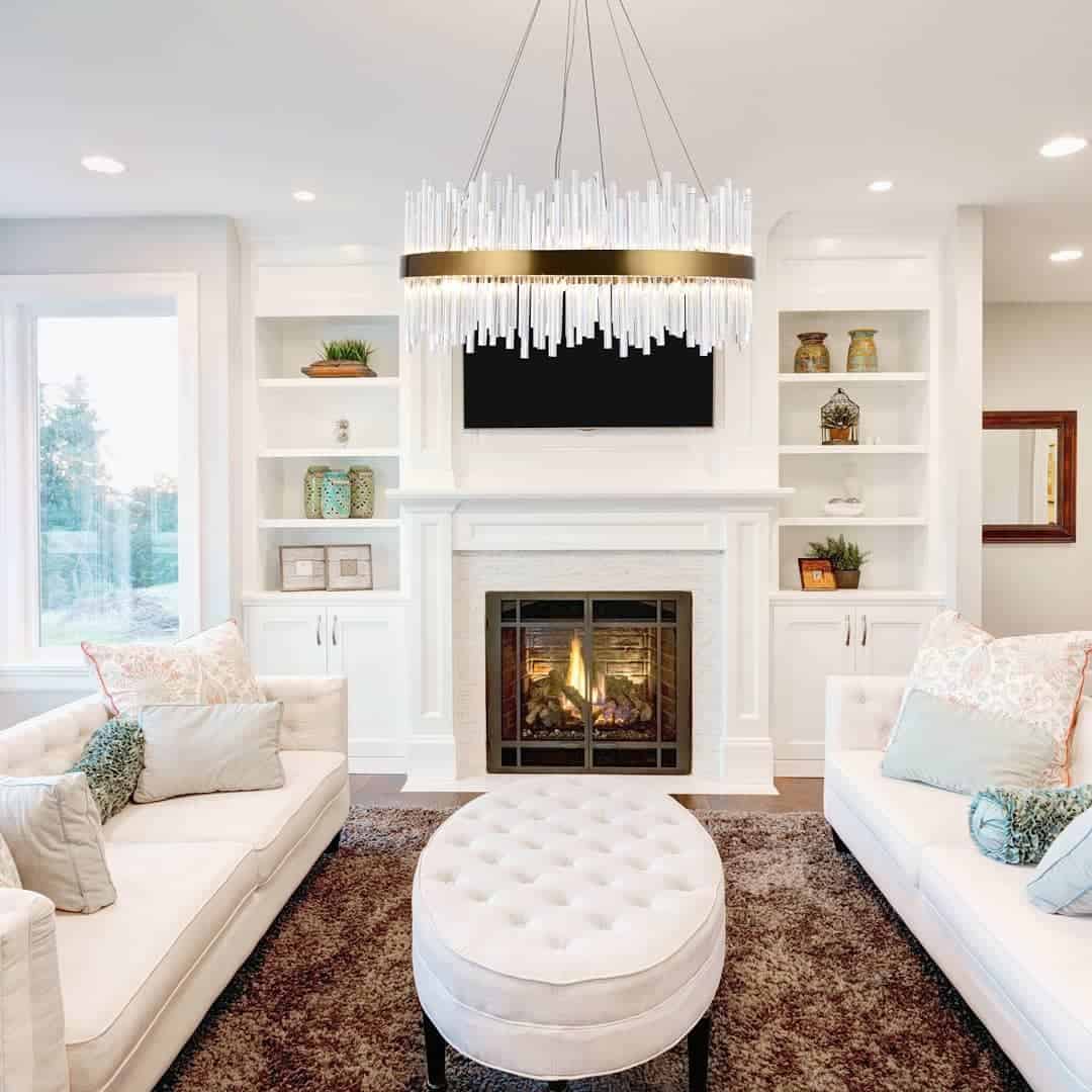 White luxury living room fireplace and two sofas