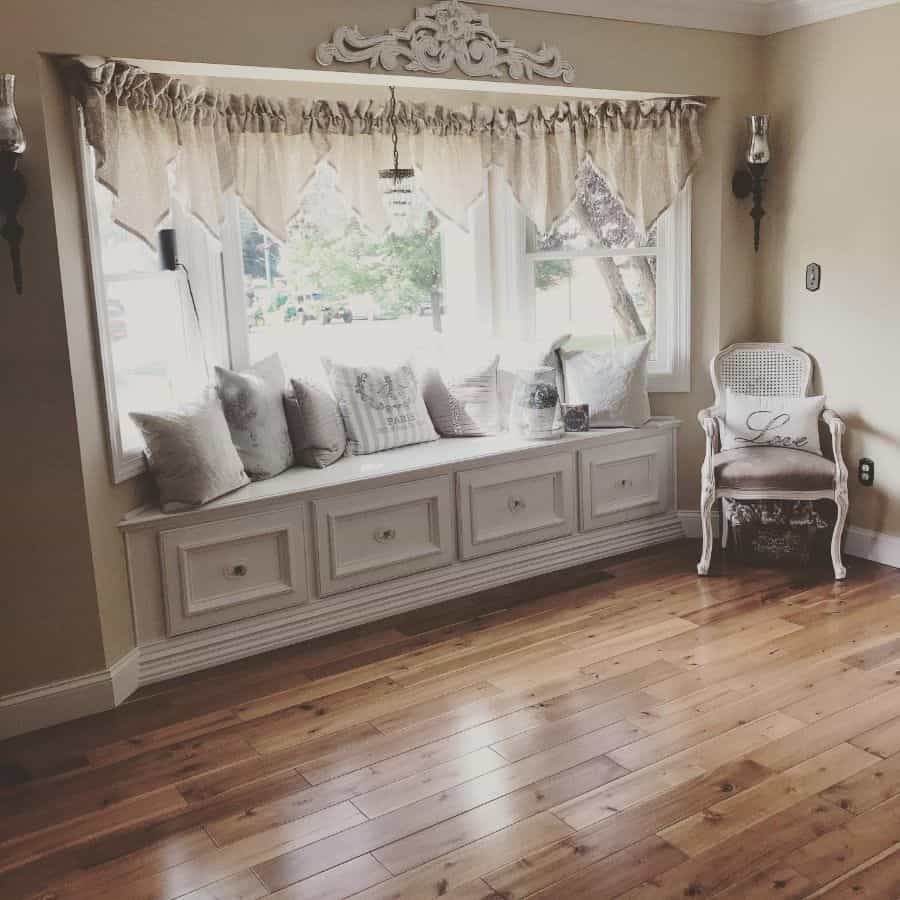 White vintage wicker chair with window seat and accent for a large room 