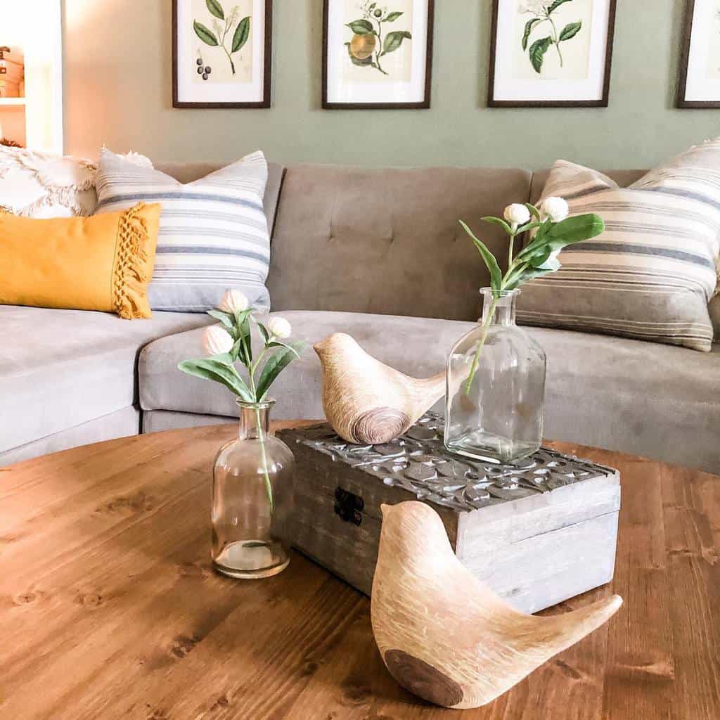 gray sofa, living room, wooden dove ornaments 