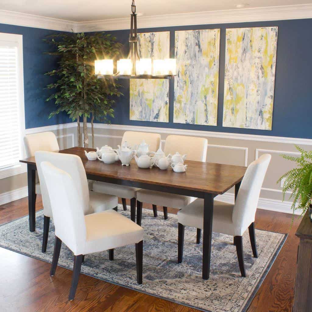 Two-tone dining room with gray and blue wall and tea set