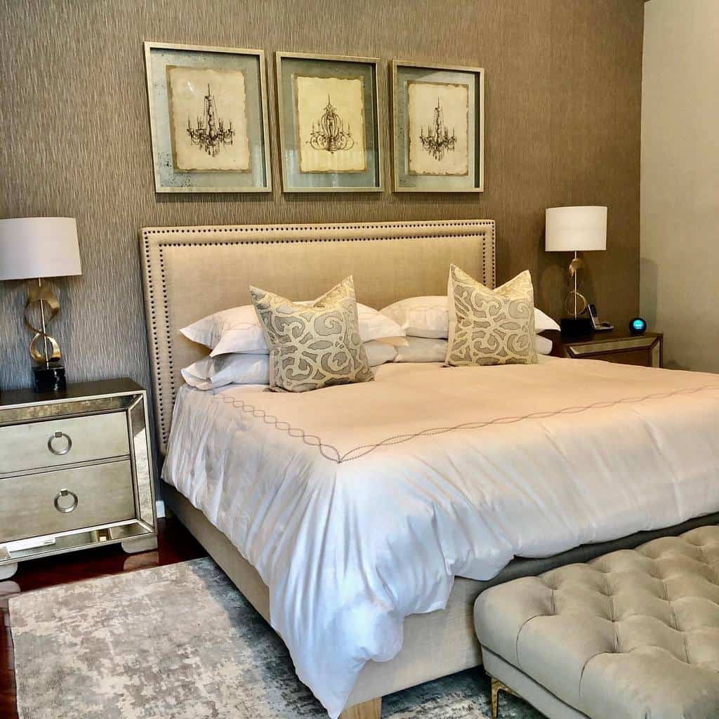 Elegant bedroom with gray walls, framed faux silver bedside tables 