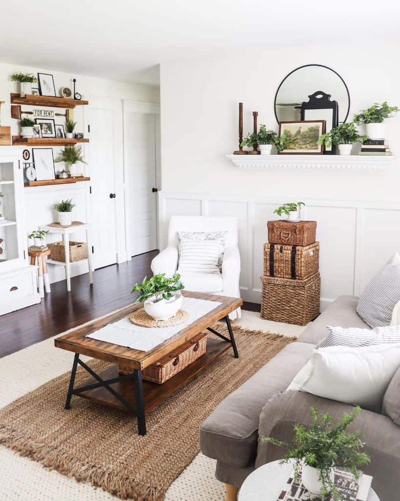 White rustic living room with vintage furniture and plants 