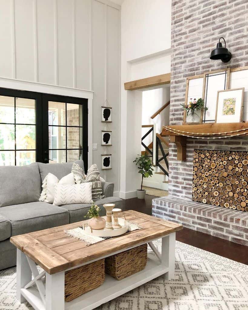 Rustic farmhouse living room with brick fireplace 