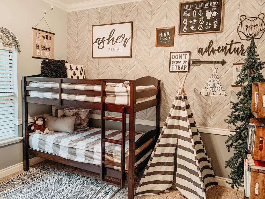 Rustic nursery with bunk bed and framed teepee wall art