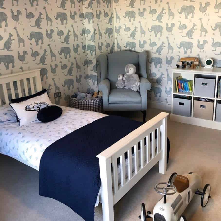 Animal wallpaper boys bedroom white bed gray seat toy car