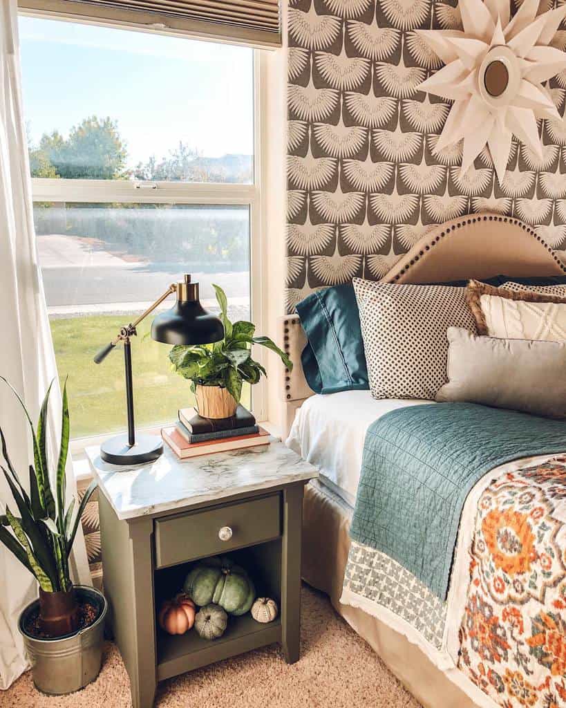 Printed bedroom wallpaper, gray bedside table, potted plants