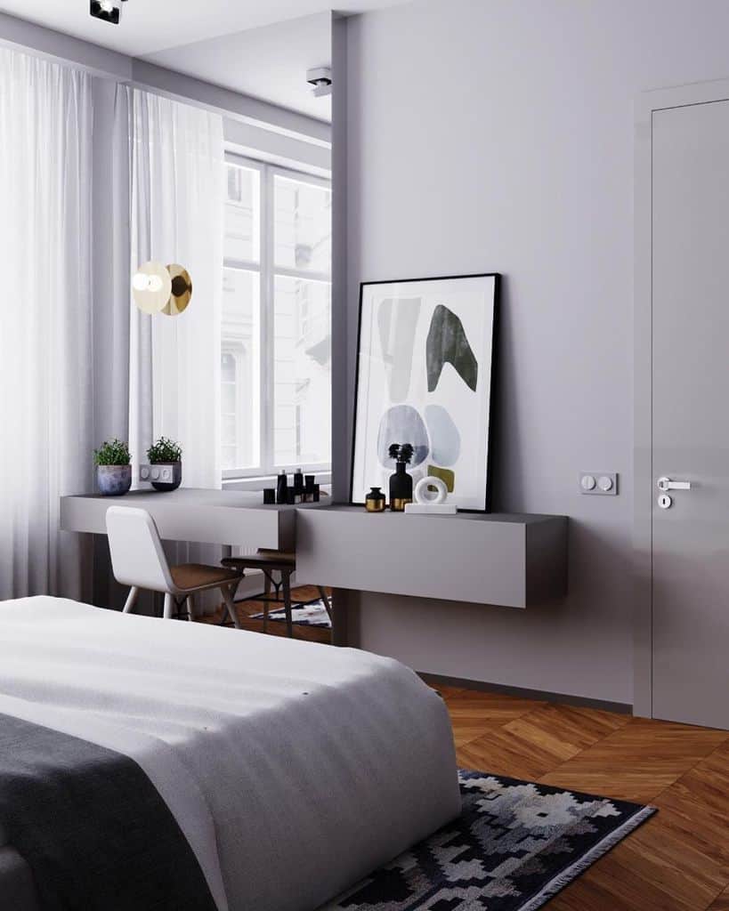 Gray bedroom with dressing table and large wall mirror 