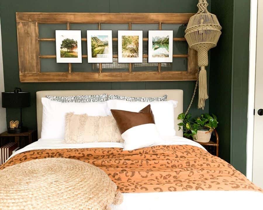 Small vintage bedroom with green wall and rustic accents 
