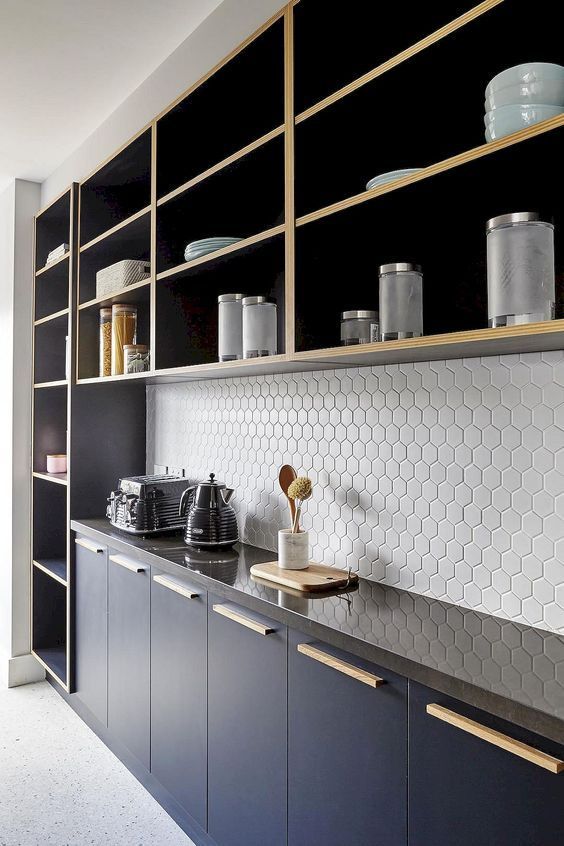 White hexagon penny tiles with white grout add texture and geometry without standing out too much
