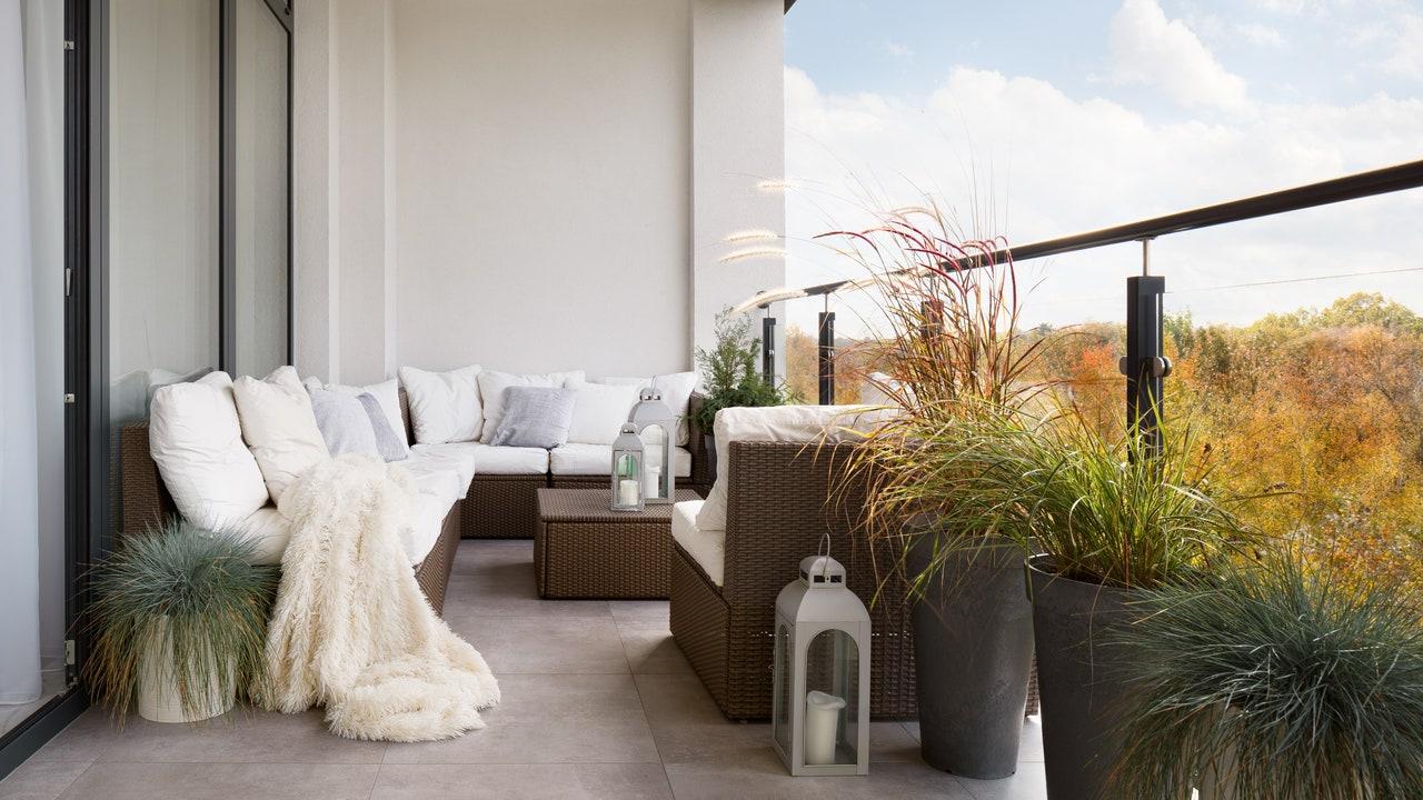 Use décor that reflects your style for personality on small balconies