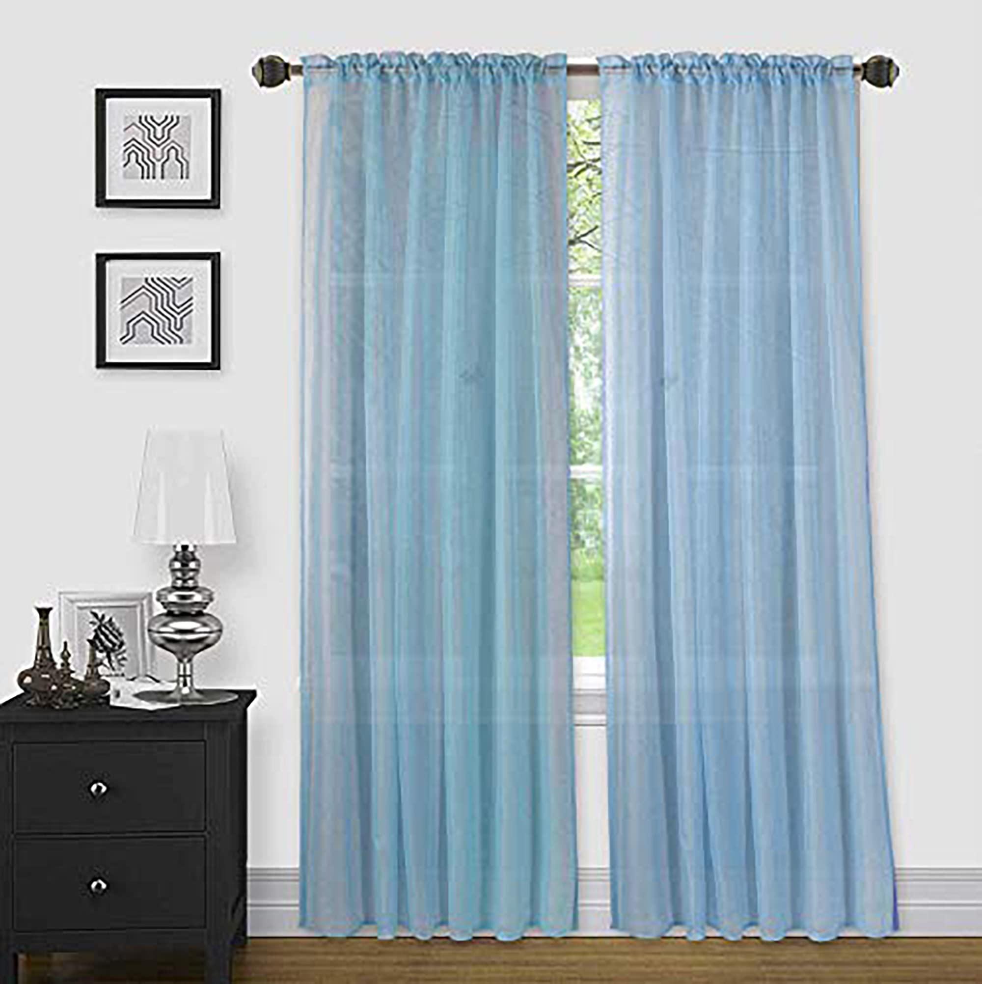 Install sheer curtains for a breezy feel in your blue living room