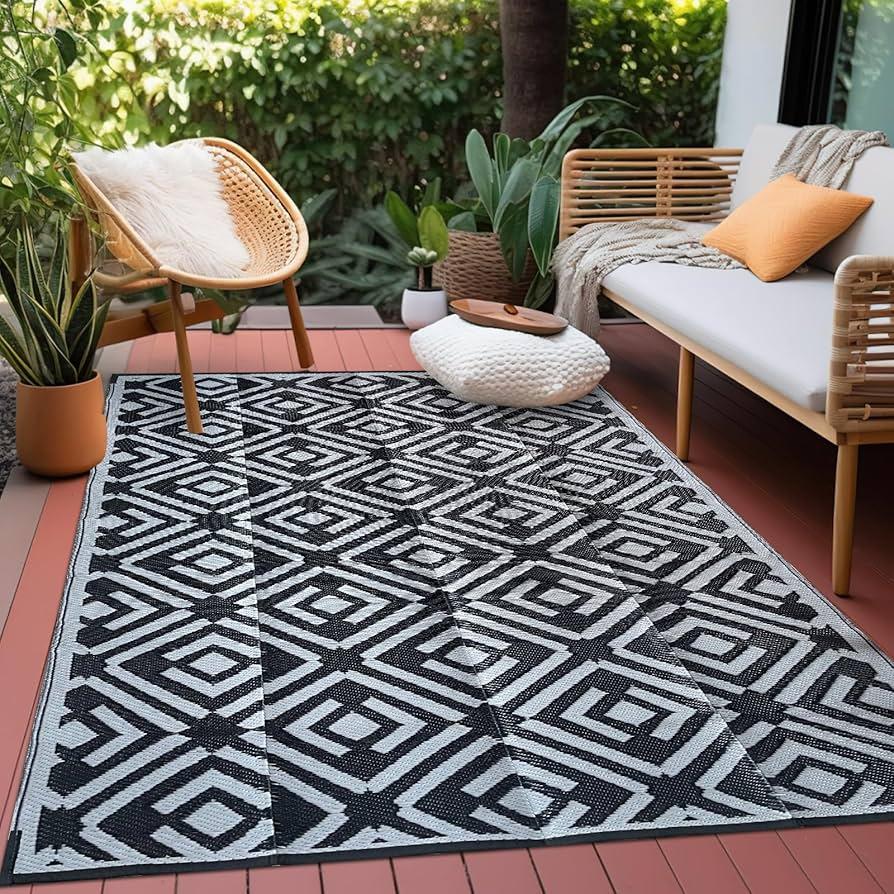 Use outdoor rugs to define zones on your small balcony