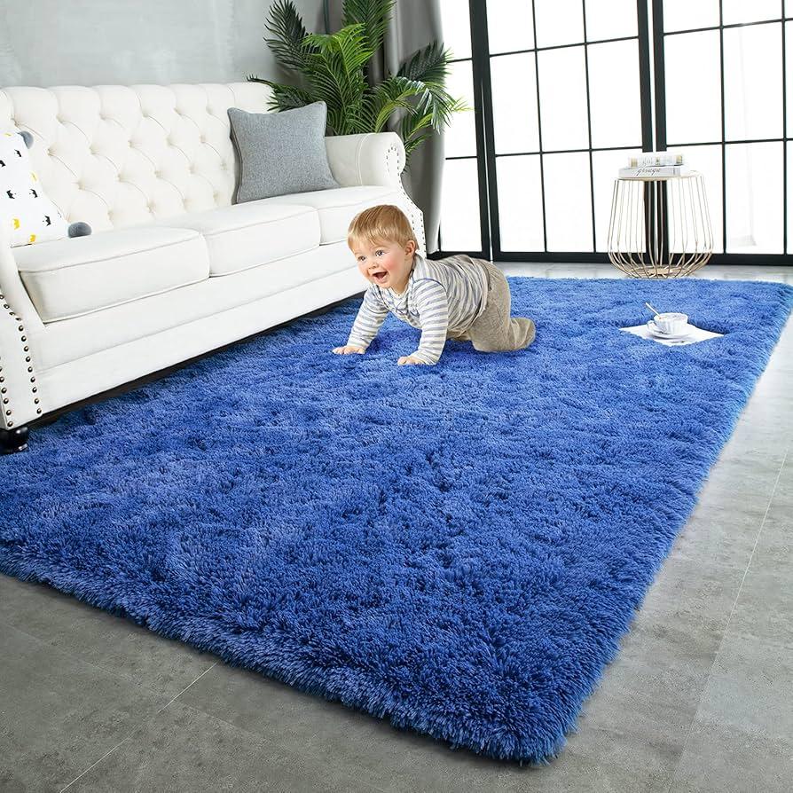 Use a plush area rug to anchor your blue living room