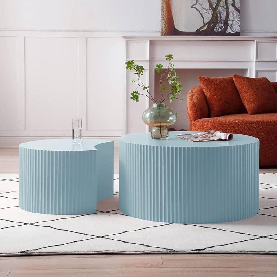 Use a stylish coffee table for functionality in your blue living room