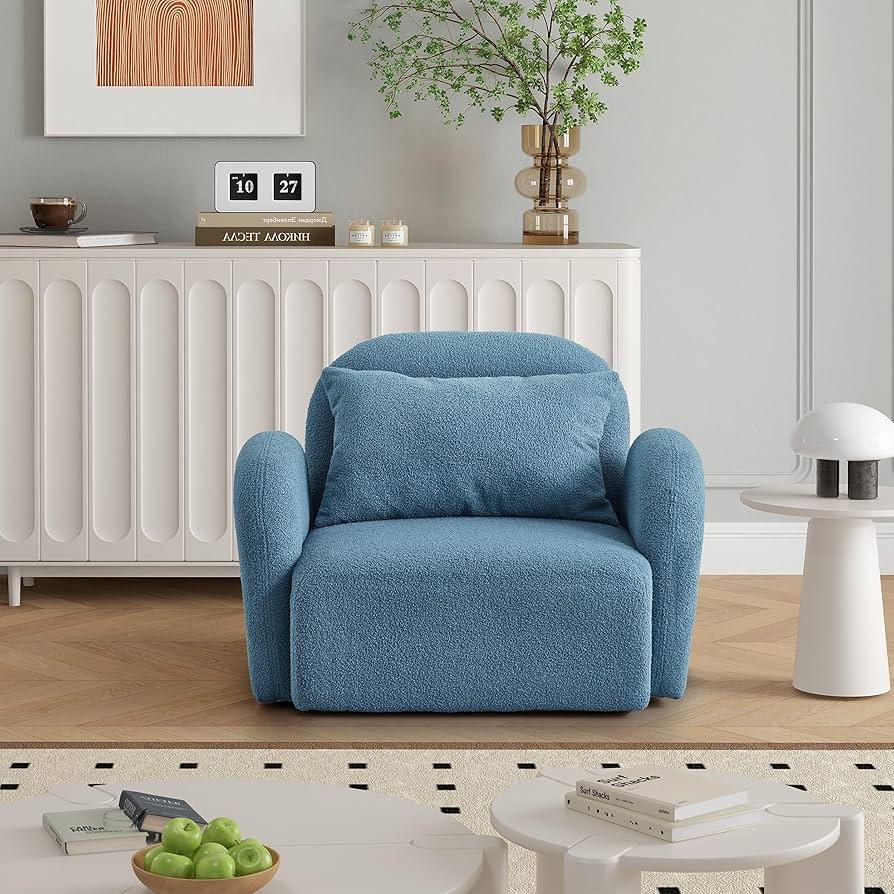 Incorporate a reading nook with a soft chair in your blue living room