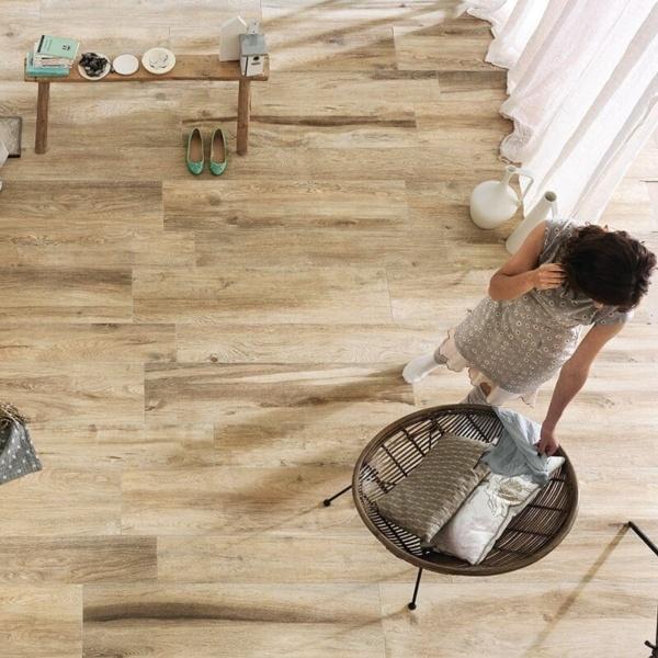 A wooden bathroom floor adds warmth while providing slip resistance and durability