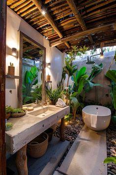 Incorporate a water feature for soothing sounds in your boho bathroom