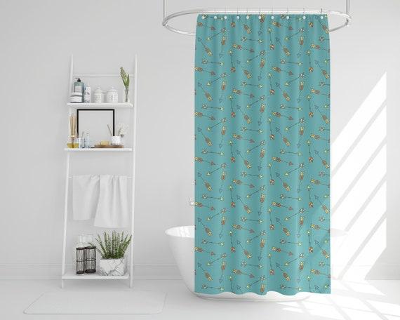 Feature playful prints on shower curtains for personality in your boho bathroom