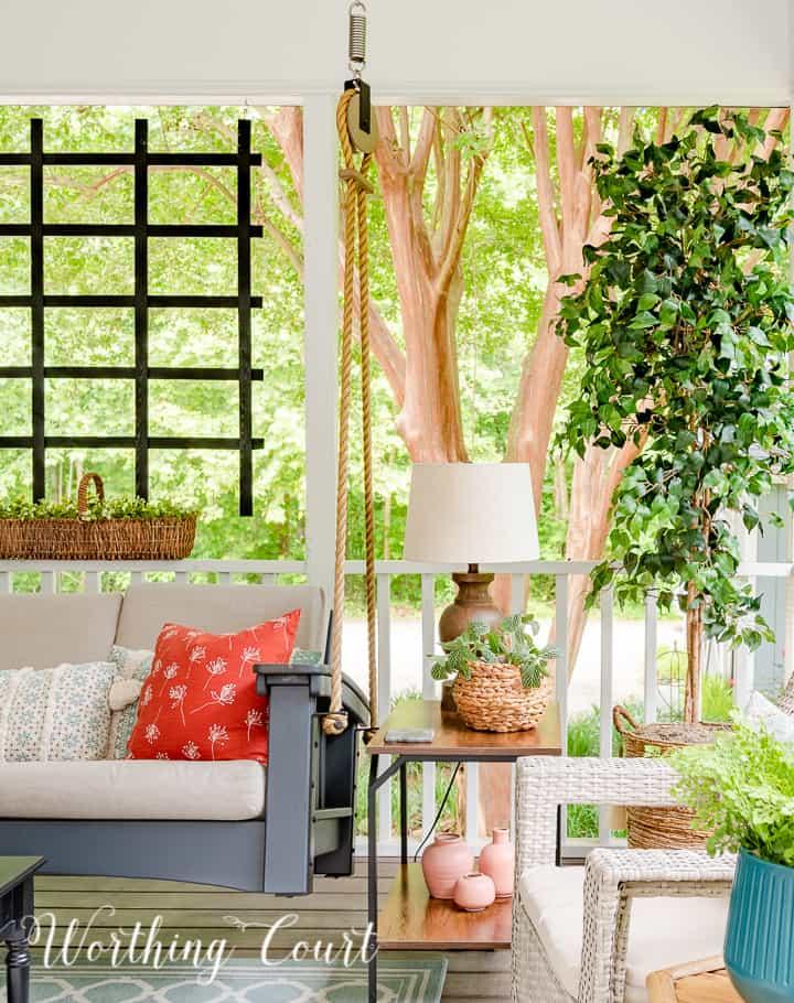 Hang up art and photographs to personalize your screened porch