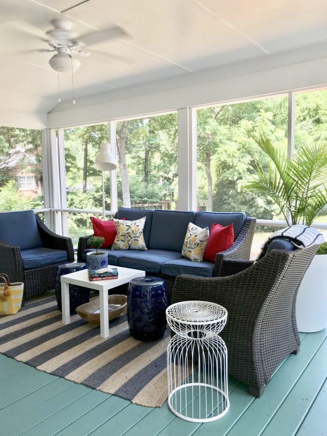 Incorporate outdoor rugs for added comfort and style on your Screened Porch