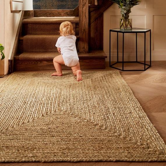 Decorate with natural fiber rugs to ground your earthy living rooms aesthetic