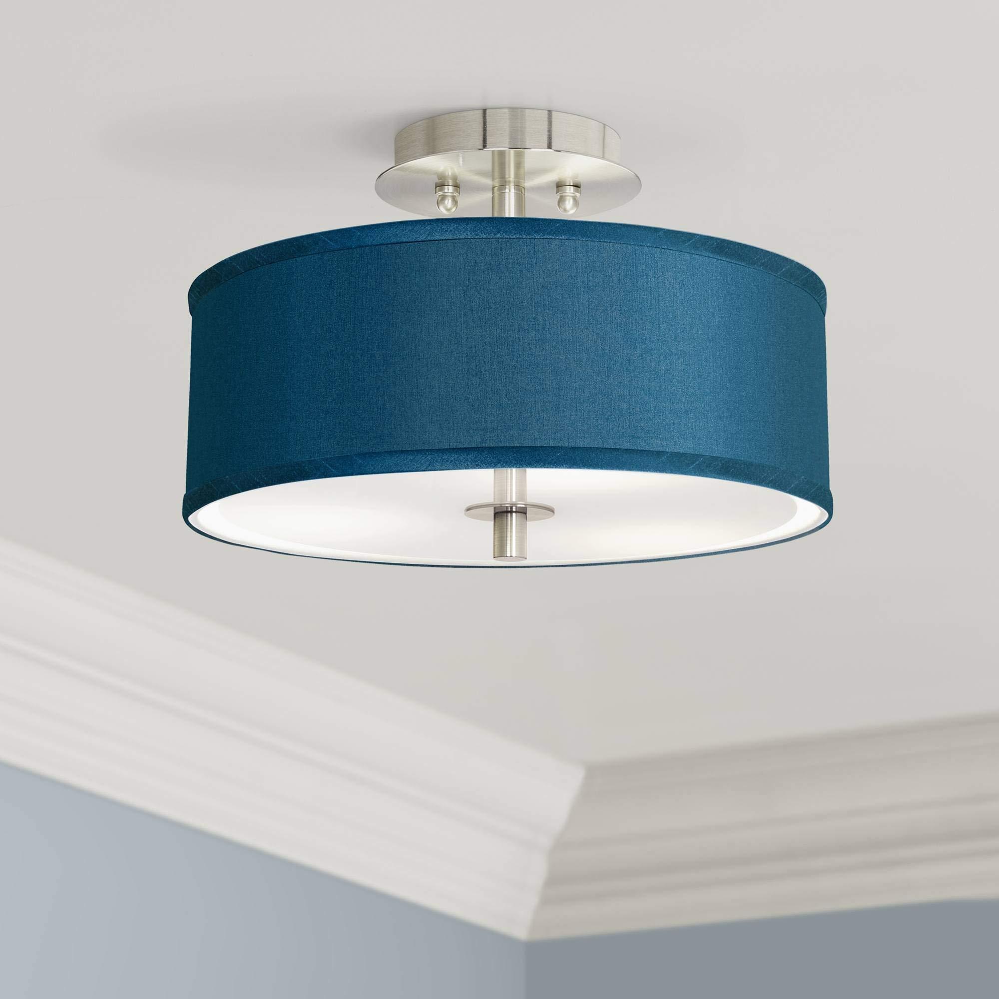 Choose blue lighting fixtures to accentuate your living room design