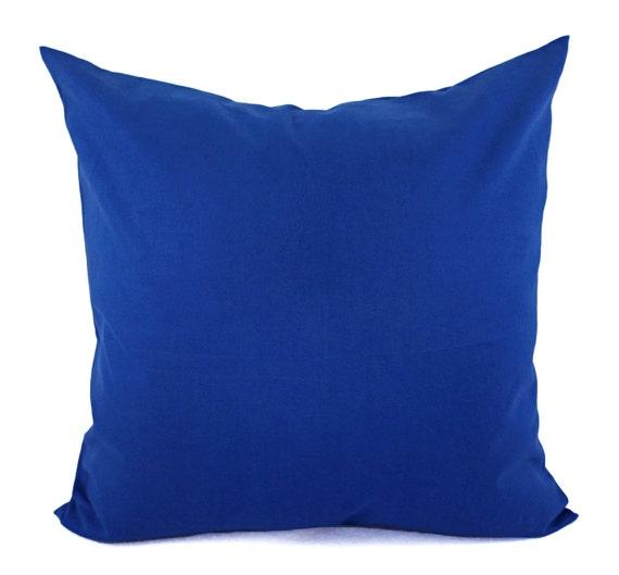 Add vibrant blue throw pillows for a cozy touch