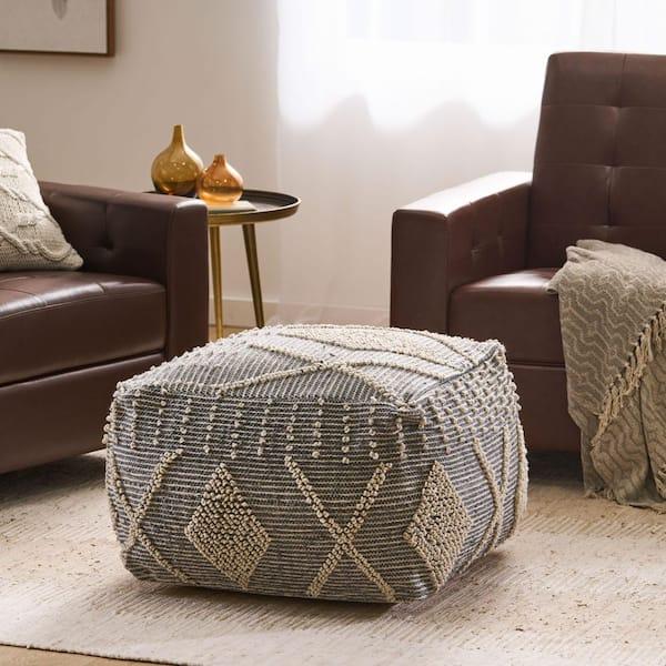 Include a natural fiber pouf for extra seating in your earthy living room