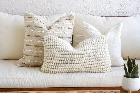 Add ‍texture with throw pillows in your interior design