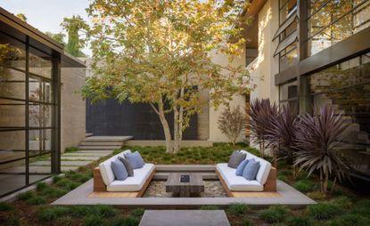 Build a sunken seating area for intimate backyard conversations
