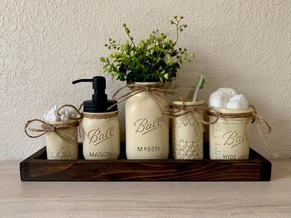 Brighten your farmhouse bathroom with fun and playful accessories for added charm