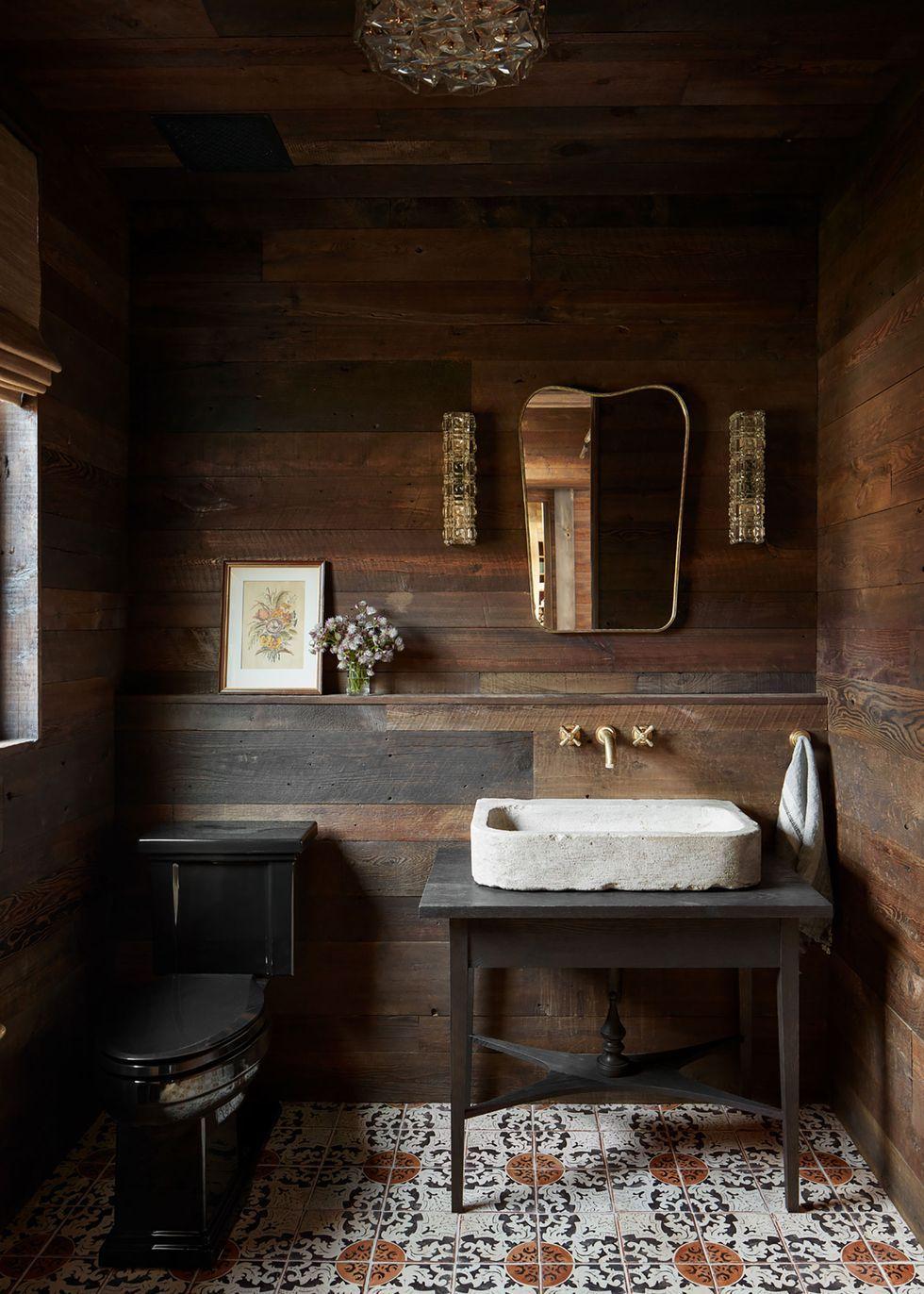 Warm wooden tones can make a small bathroom feel larger and more inviting